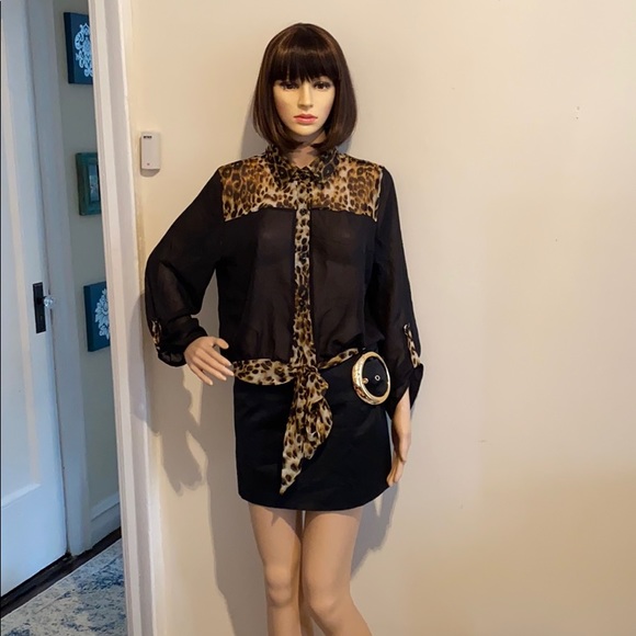 Touch Me Tops - Brand new blouse. Very interesting.
